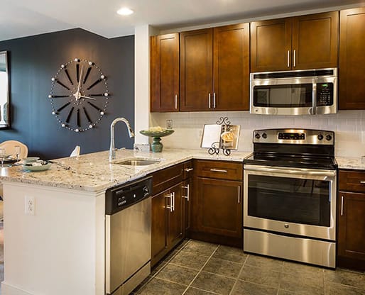 Stainless steel Energy Star appliances at Aurora Apartments, North Bethesda, MN