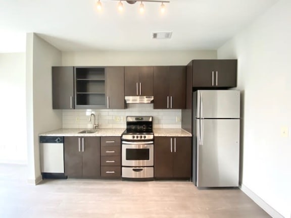 Fully Furnished Kitchen With Stainless Steel Appliances at Station 40, Nashville