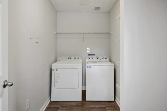 Laundry Room with Washer and Dryer  located at Crestmark Apartments in Lithia Springs, GA 30122