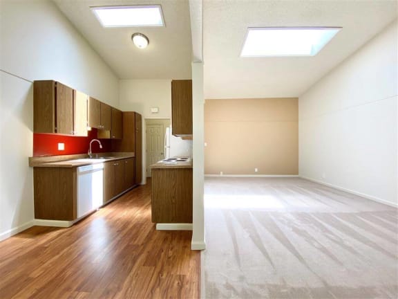 Wood-Style Flooring in Kitchen at Valley West Apartments in San Jose, CA 95122