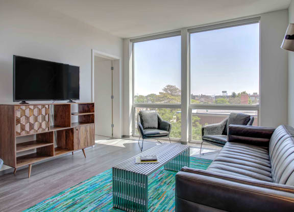 Living Room With Expansive Window at Noca Blu, Chicago, IL, 60647