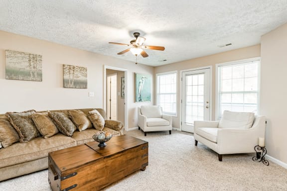 Living Room with Carpeting at Heritage at Fort Bragg, Spring Lake