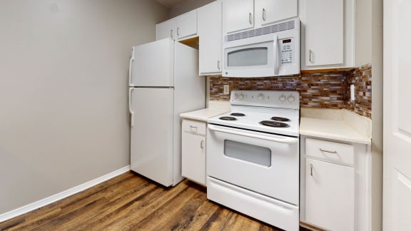 Kitchen with White Appliances at Ivy Hollow, Charlotte, 28262