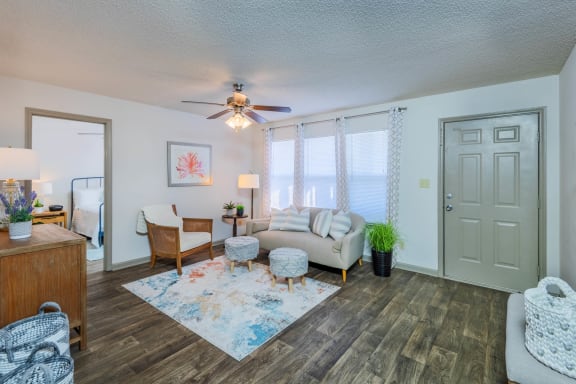 Living Room with Wood Style Flooring at Lofts of Wilmington, Wilmington, NC, 28405