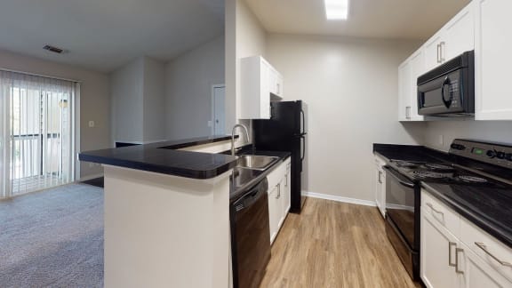 Kitchen with Breakfast Bar at Montclair Apartments, Silver Spring, Maryland
