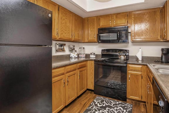 Efficient Appliances In Kitchen at Woodland Hills Apartments, Colorado Springs, 80918