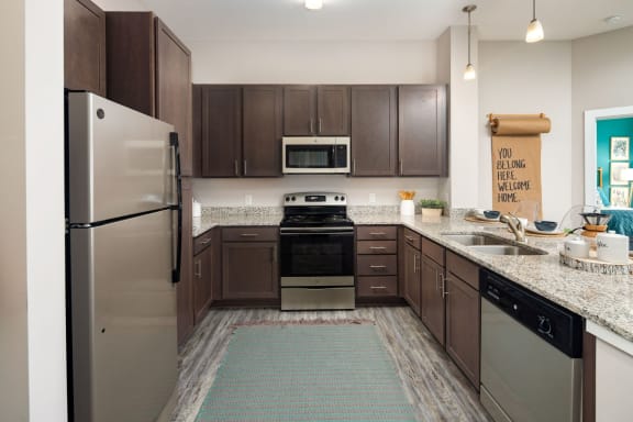 Refrigerator And Kitchen Appliances at Abberly Solaire Apartment Homes, Garner, NC, 27529