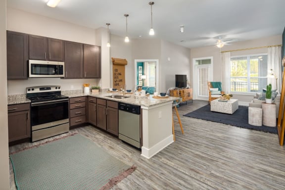 Kitchen with appliances at Abberly Liberty Crossing Apartment Homes, Charlotte, 28269