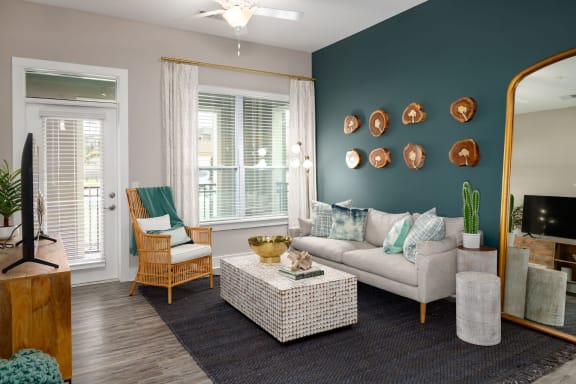 Living room area decor at Abberly Liberty Crossing Apartment Homes, Charlotte, NC