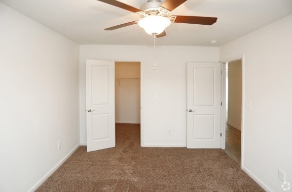 bedroom with bathroom and closet at Hawthorne Properties, Lafayette