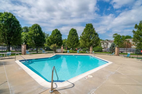 Outdoor Swimming Pool with Large Sundeck and Wi-Fi at The Highlands Apartments, Elkhart