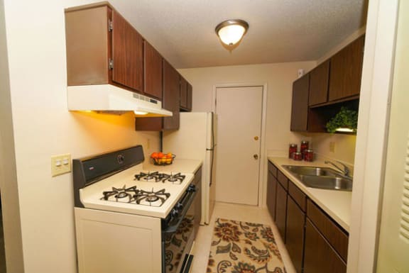 Kitchen with Gas Range at Madeira Apartments in Kalamazoo, MI 49001