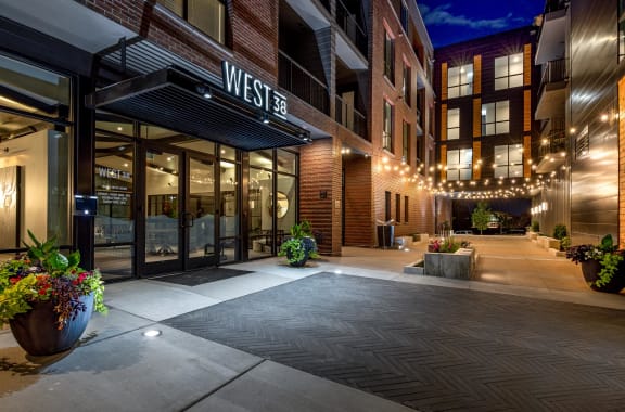 West 38 Apartments Exterior Entrance at Night