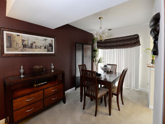 Open concept living room and dining room at McDonogh Village Apartments