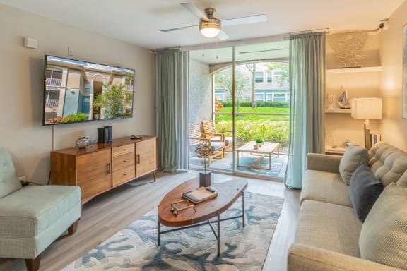 Spacious Living Room With Private Balcony at The Boot Ranch Apartments, Palm Harbor