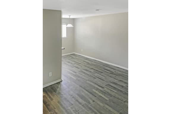 Living room flooring at The Life at Park View, Texas, 77502
