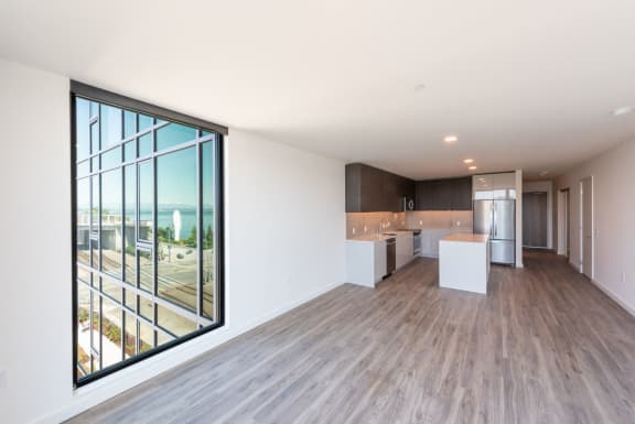 Living Room With Floor-to-ceiling Windows at 10 Clay Apartments in Seattle, WA