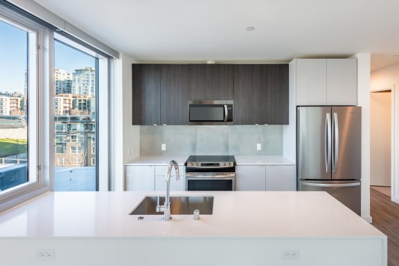 Kitchen With Quartz Counter tops at 10 Clay Apartments in Seattle, WA, 98121