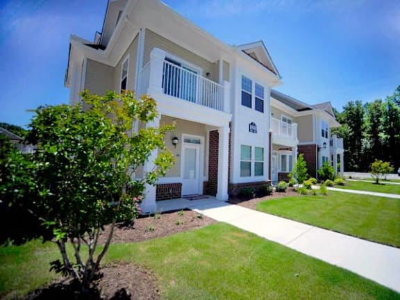 Luxury apartment exterior with neat lawn and sidewalks at Fenwyck Manor Apartments, Chesapeake