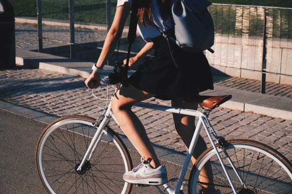 Resident Riding a Bike at The District at Forestville