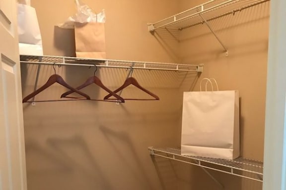 Large closet with built-in wire shelving at Centerville Manor Apartments, Virginia Beach, VA, 23464