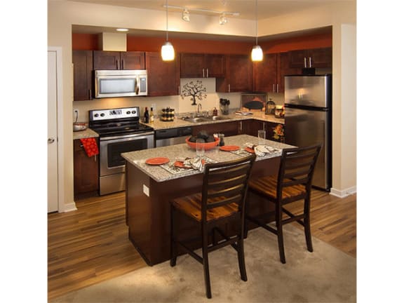Kitchen Designed With Island at The Trails at Timberline, Fort Collins, Colorado