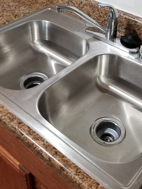 Double Sink with Integrated Sprayer at Candlewyck Apartments, Kalamazoo, MI