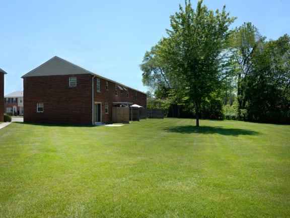Beautiful landscaping at Yorktowne Townhomes with private patios
