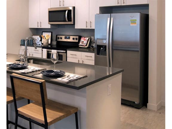 Fully Equipped Kitchen at Cycle Apartments, Colorado