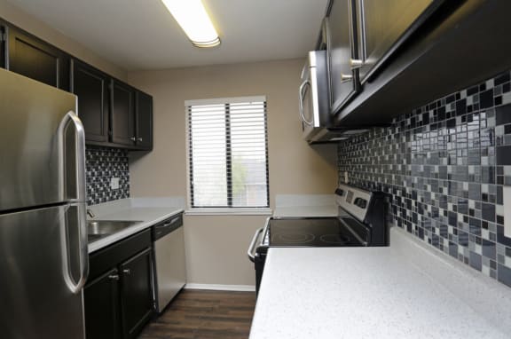 Refrigerator And Kitchen Appliances at Water Ridge Apartments, CLEAR Property Management, Irving, 75061