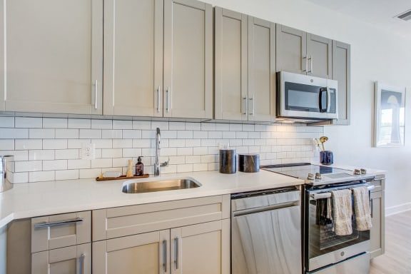 Chef-Inspired Kitchens Feature Stainless Steel Appliances at Centro Arlington, Virginia, 22204