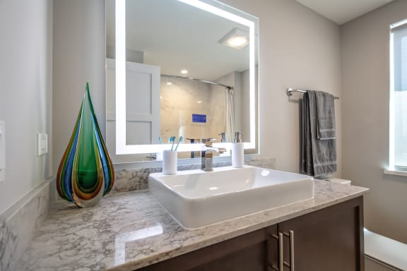Designer Mirror and quartz countertops at Park Heights by the Lake Apartments, Chicago, IL