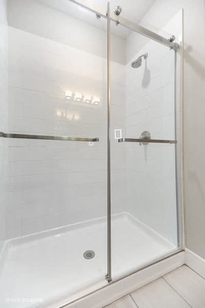 Modern sliding glass shower