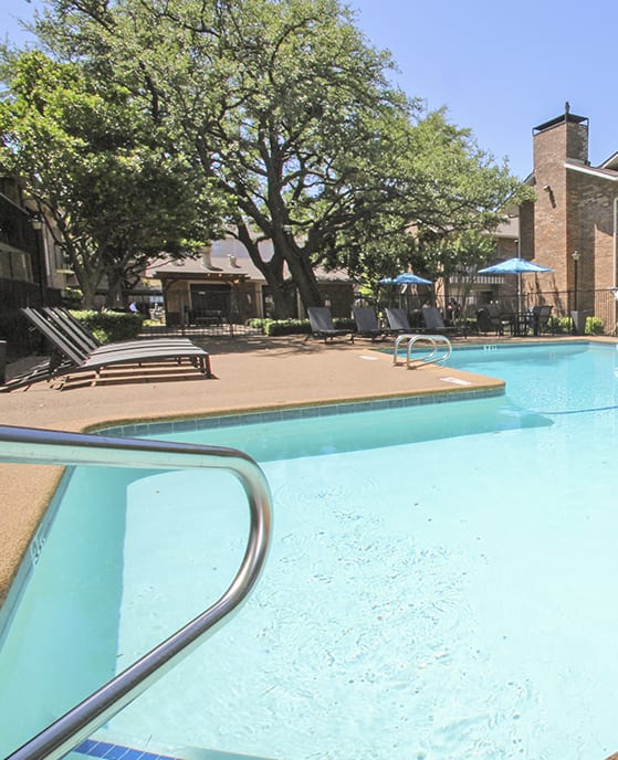 This is a photo of the pool at Preston Park Apartments in Dallas, TX