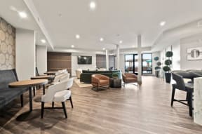a living room filled with furniture and a flat screen tv