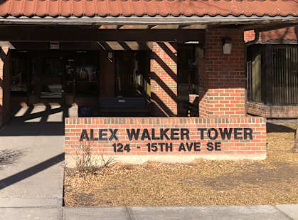 The front of the Alex Walker Tower building at 124-15th Ave SE.