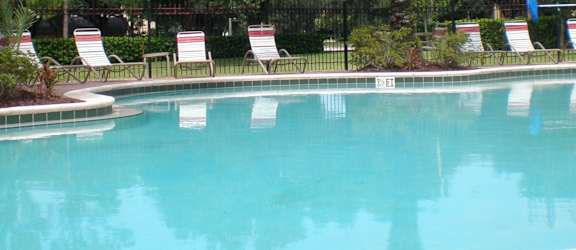 Lounge Chairs at Villa Valencia Apartments, Orlando, Florida