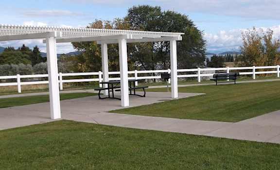 Image of patio with table and the lawn