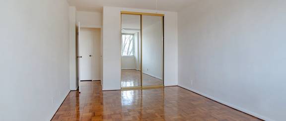 bedroom with hardwood floors