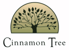 a logo of a tree and the words cinnamon tree
