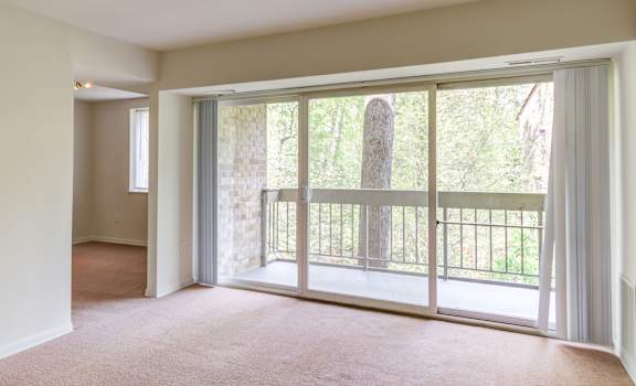 Large sliding glass door to a spacious patio