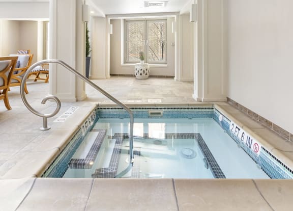 a swimming pool in a lobby of a hotel at HIGHGROVE, Stamford