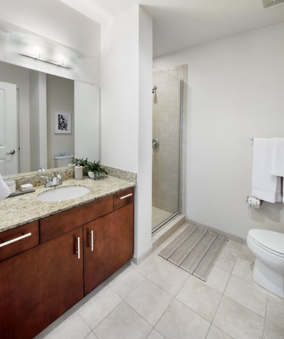 a bathroom with a toilet sink and shower at Element, Tampa, FL, 33602