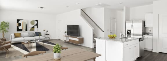 a kitchen with white cabinets and a granite counter top