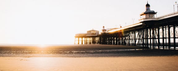 Beach with pier.