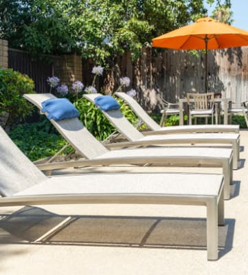 Relax by the Pool at Walnut Woods Apartments | Turlock Rentals