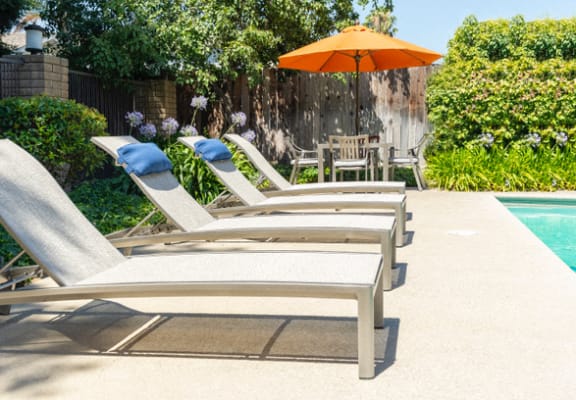 Relax by the Pool at Walnut Woods Apartments | Turlock Rentals