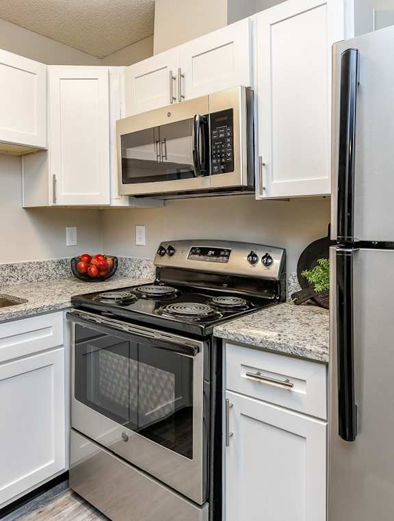 a kitchen with a sink and a counter top at The Ridge at Chenal Valley, Little Rock, Arkansas