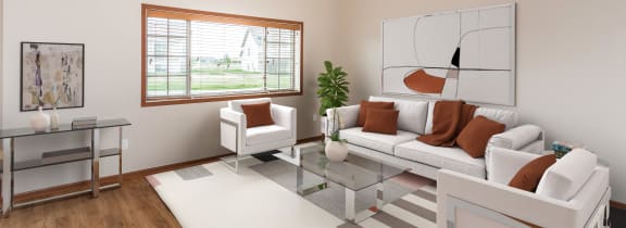 a living room with white couches and a glass coffee table  at Sterling Pointe, Grand Forks, ND