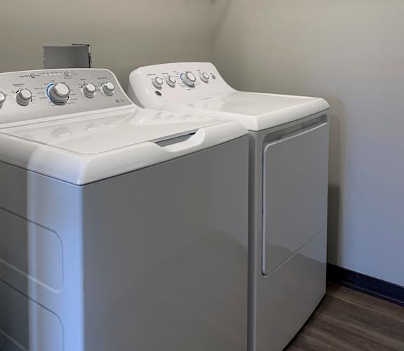 Washer and dryer laundry room at the villas at mahoney park